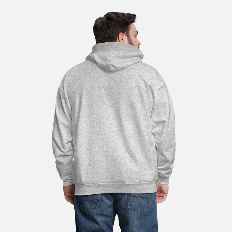 A pizza sitting on top of a pan to a television